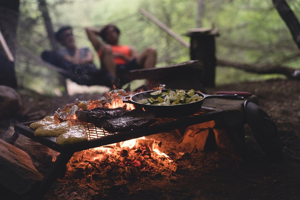 Food cooking over a campfire
