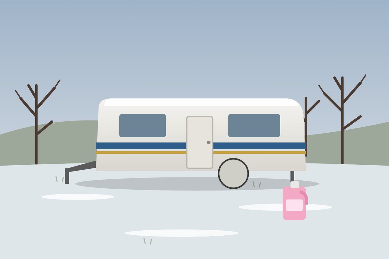 Illustration of a travel trailer parked under bare trees with frost on the ground